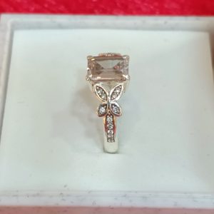 Elegant Butterfly Motif Silver Ring with Emerald-Cut Stone