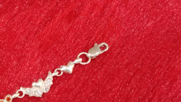 Silver Winged Heart Bracelet with Tricolor Gem Accents - Image 4