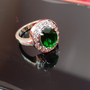 Elegant Sterling Silver Ring with Oval Green Gemstone and Halo of White Stones