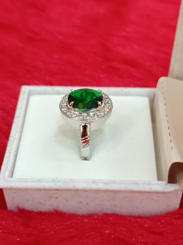 Elegant Sterling Silver Ring with Oval Green Gemstone and Halo of White Stones - Image 4