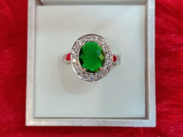 Elegant Sterling Silver Ring with Oval Green Gemstone and Halo of White Stones - Image 3