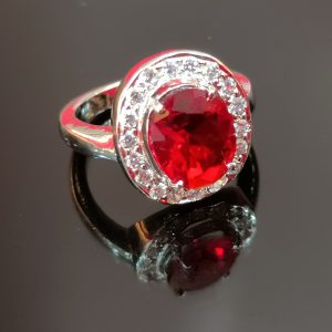 Women's Sterling Silver Ring with Red Oval Center Stone and Halo of White Cubic Zirconia