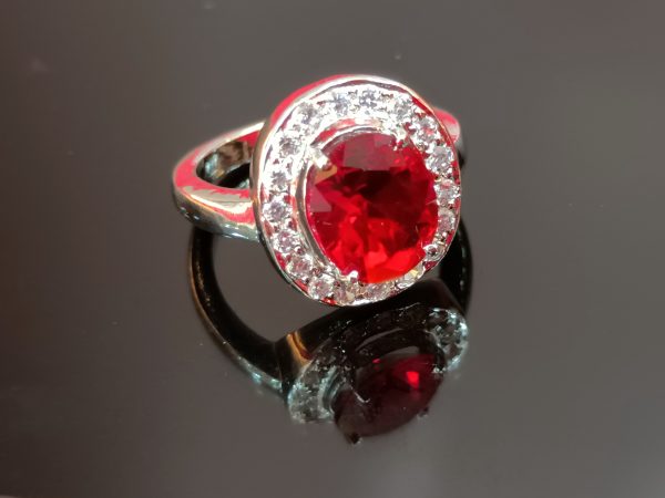 Women's Sterling Silver Ring with Red Oval Center Stone and Halo of White Cubic Zirconia