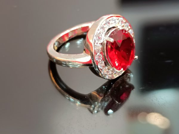 Women's Sterling Silver Ring with Red Oval Center Stone and Halo of White Cubic Zirconia - Image 2