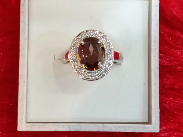 Elegant Oval-Cut Brown Gemstone Ring with Halo Setting in Sterling Silver - Image 4