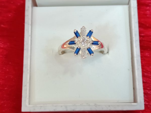 Silver-tone ring with blue and clear stones - Image 5