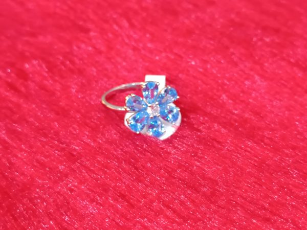 Silver Flower Ring with Sky-Blue Petal Gemstones