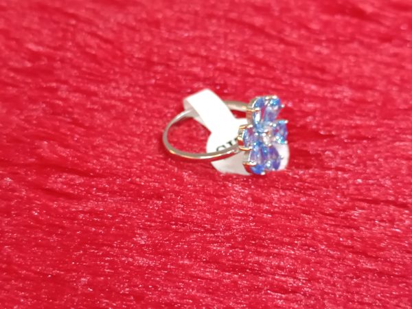 Silver Flower Ring with Sky-Blue Petal Gemstones - Image 2
