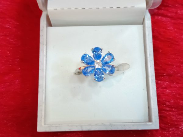 Silver Flower Ring with Sky-Blue Petal Gemstones - Image 3