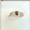 Split Band Ring with Green Oval Gemstone - Image 2