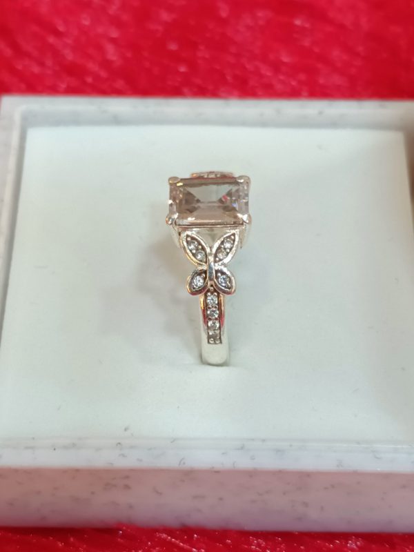 Elegant Butterfly Motif Silver Ring with Emerald-Cut Stone