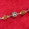 Rudraksha & Silver Om Bead Bracelet