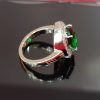 Elegant Sterling Silver Ring with Oval Green Stone and Halo of White Stones - Image 2
