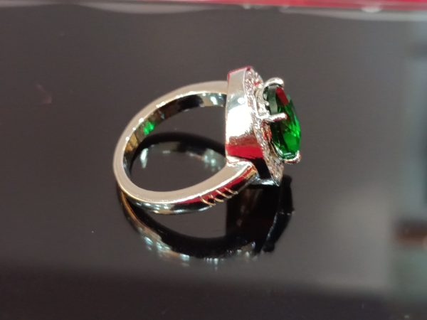 Elegant Sterling Silver Ring with Oval Green Stone and Halo of White Stones - Image 2