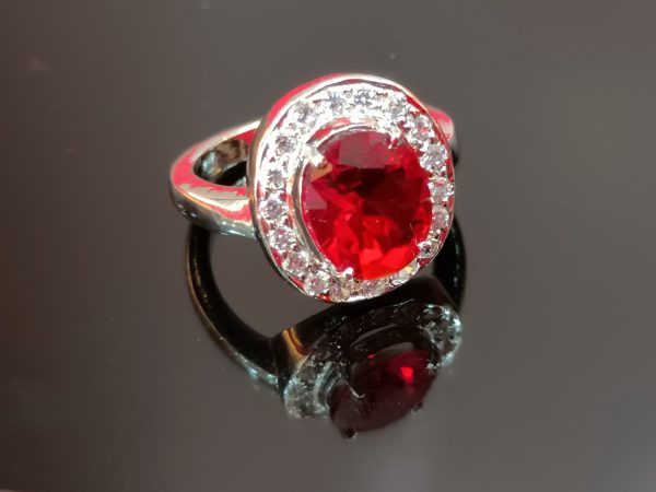 Women's Sterling Silver Ring with Red Oval Center Stone and Halo of White Cubic Zirconia