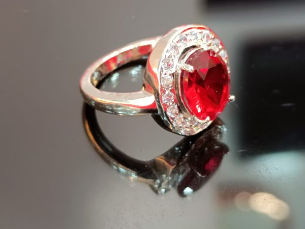 Women's Sterling Silver Ring with Red Oval Center Stone and Halo of White Cubic Zirconia - Image 2