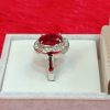 Women's Sterling Silver Ring with Red Oval Center Stone and Halo of White Cubic Zirconia - Image 3