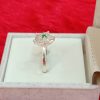 Silver Floral Cluster Ring with Green Center Stone - Image 4