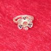 Floral Gold Ring with Sapphire Accents - Image 4