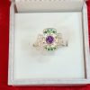 Silver Floral Ring with Amethyst and Emerald Accents