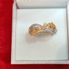 Elegant Emerald & Diamond Twisted Band Ring - Image 2