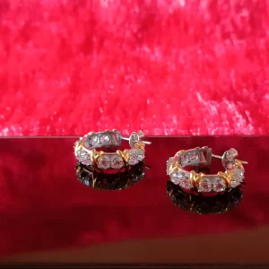 Round Brilliant Diamonds Topped by Golden Xs Hoop...